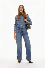 A sleek pair of slim-fit jeans with stylish stud detailing for an edgy yet sophisticated look. Designed with a flattering silhouette and premium stretch fabric for comfort.